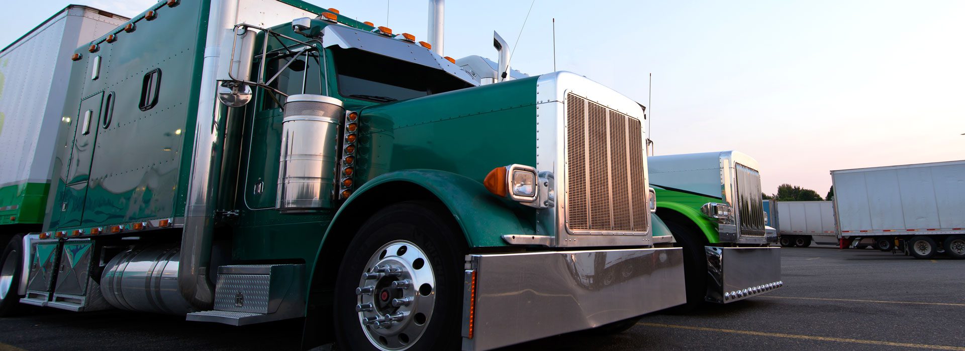 Header-Truck-in-Parking-Lot