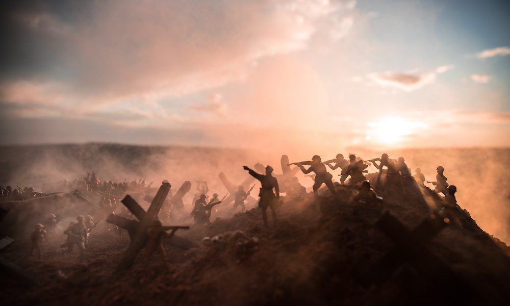 World War 2 reenactment (D-day). Creative decoration with toy soldiers, landing crafts and hedgehogs. Battle scene of Normandy landing on June 6, 1944.