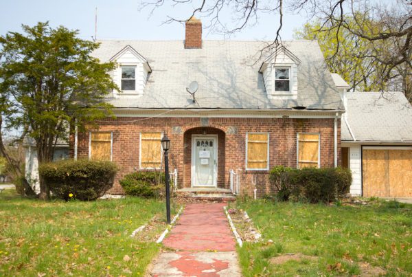Boarded Up Home in Foreclosure