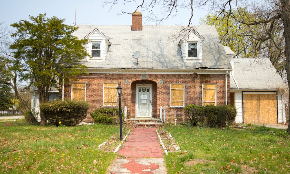 Boarded Up Home in Foreclosure